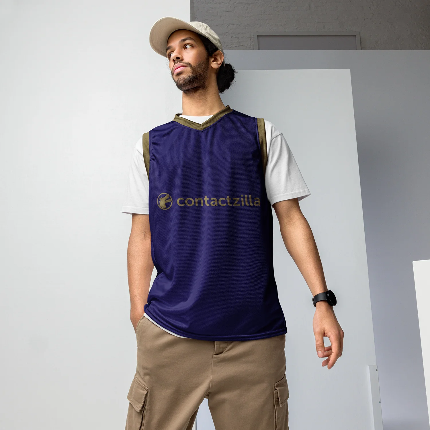 Man wearing a Contactzilla all over print, recycled basketball jersey.