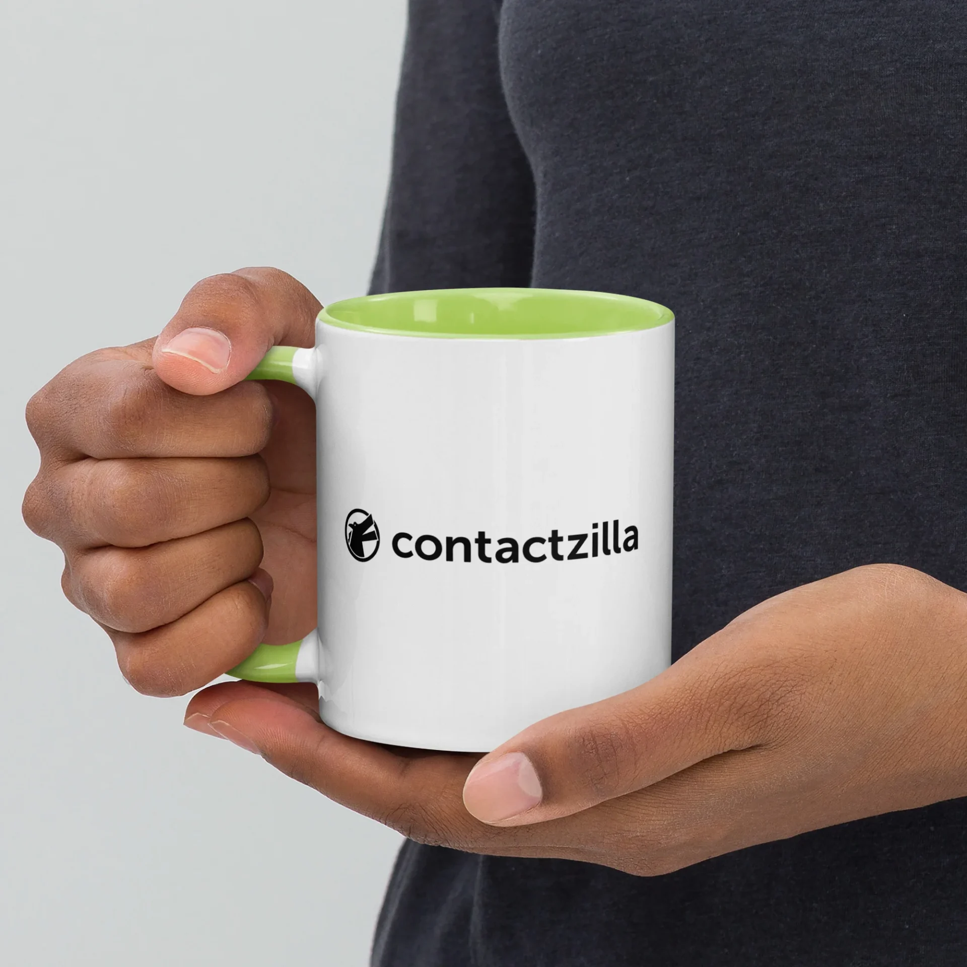 Contactzilla ceramic mug showing the full logo.